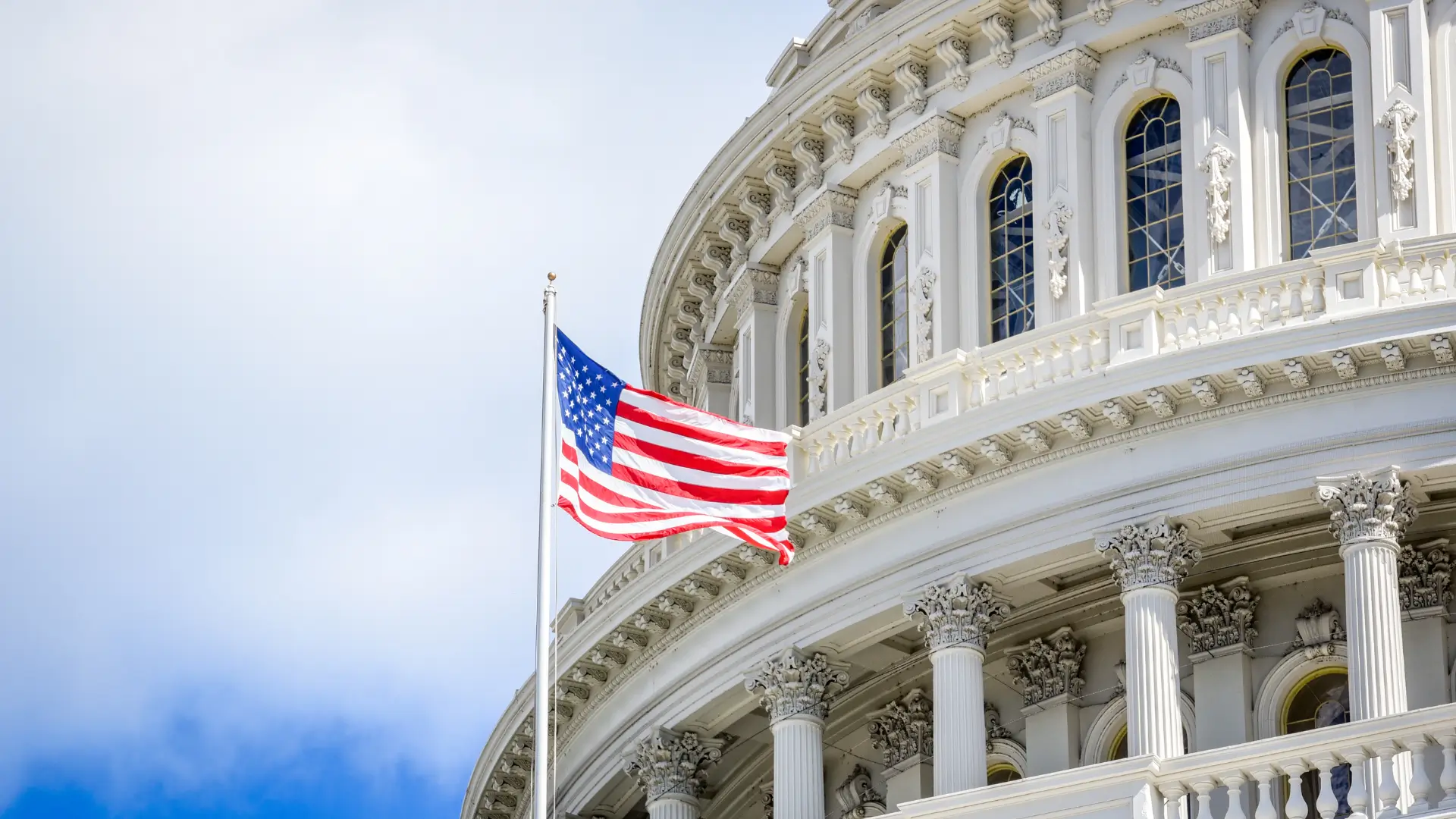 U.S. Capitol building with American flag.